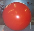 7ft. red helium balloon from $269.00. 7ft. balloon with artwork or lettering from $533.00. Reusable.