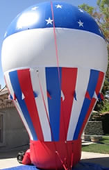 Red White and Blue 25' cold-air inflatable - all types of helium balloons and cold-air balloons.