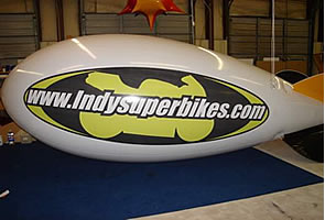14' helium advertising blimp with custom artwork=$1021
