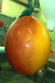 Peach helium balloon - we manufacture custom helium fruit shape balloons in the USA!