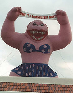 Queen Kong inflatable - Giant pink female gorilla inflatables for sale and rent.