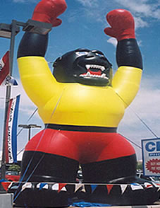 Red and Yellow Kong - We have many kong balloons and gorilla inflatables available for sale and rent.